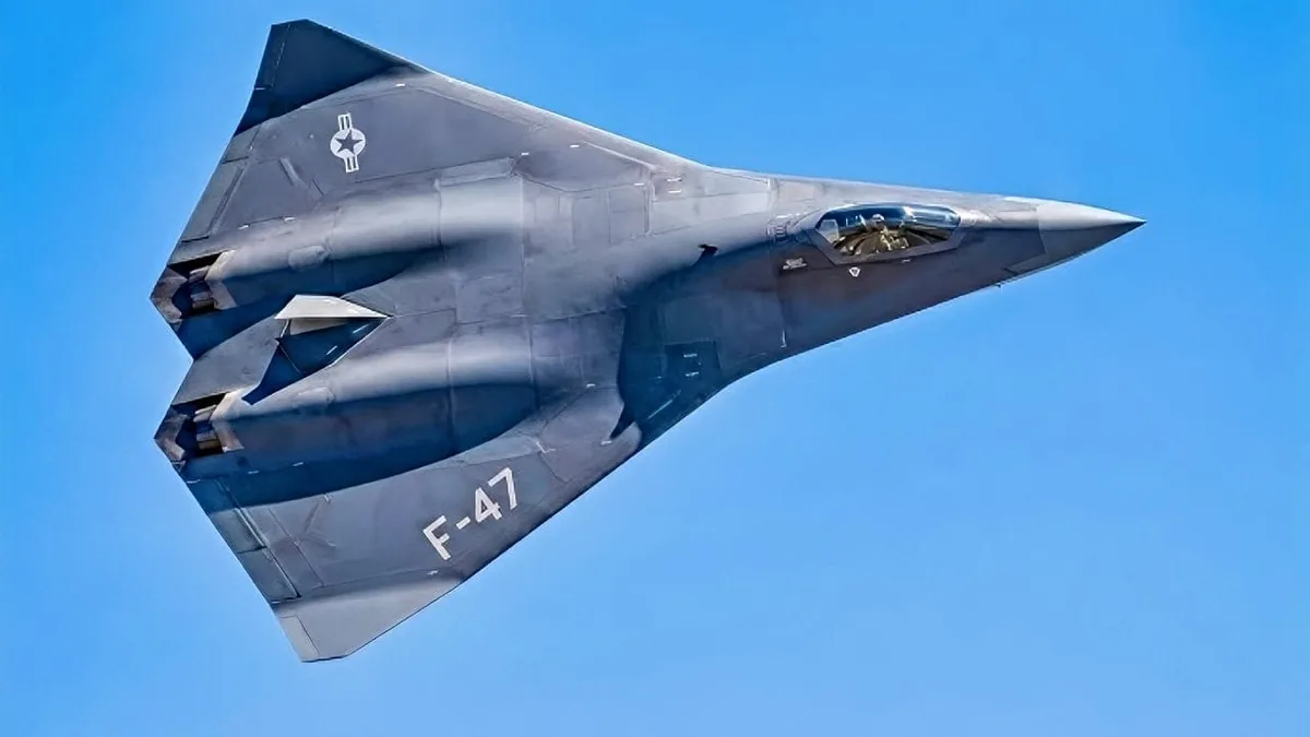 Side view of a gray stealth fighter jet in flight against a blue sky, with 'F-47' markings on the fuselage.